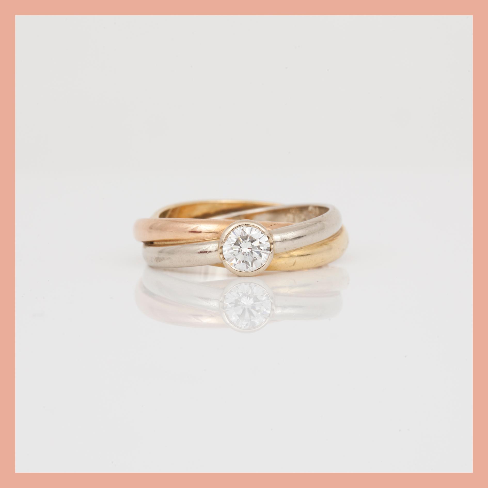 RING, trefärgad 18K guld med briljantslipad diamant, ca 0,40 ct, "Trinity", Cartier. Total vikt ca 6,82 g.