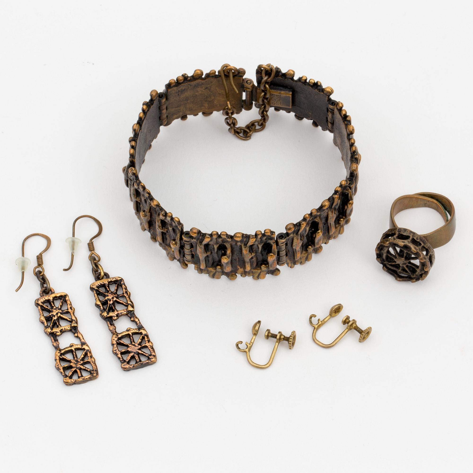 A bronze bracelet, ring and a pair of earrings by Pentti Sarpaneva, Finland.