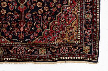 A semi-antique Sarouk rug, west Persia, c. 205 x 131 cm.