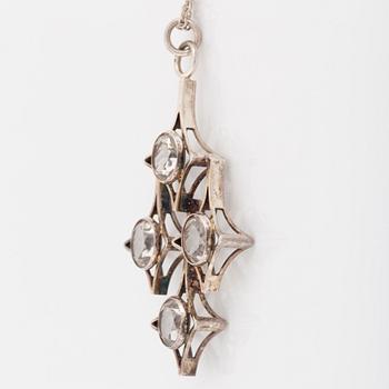 Kultasepät Salovaara, sterling silver bangle and pendant with rock crystal and syntehtic white spinel.