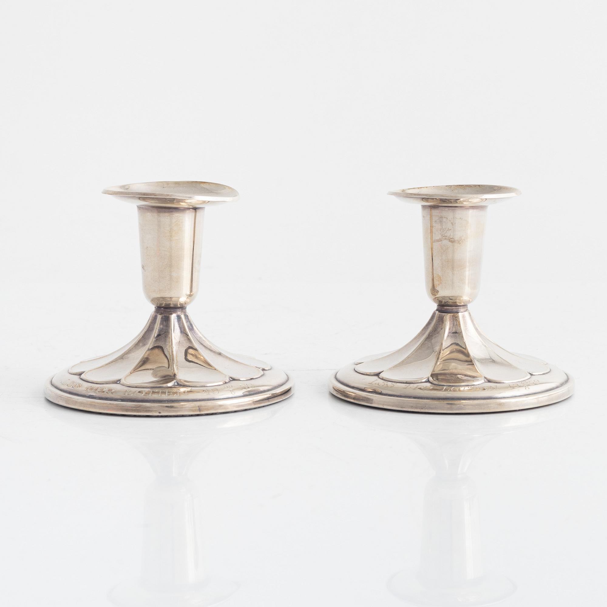 A pair of Swedish silver candlesticks, mark of K&EC, Gothenburg 1959.