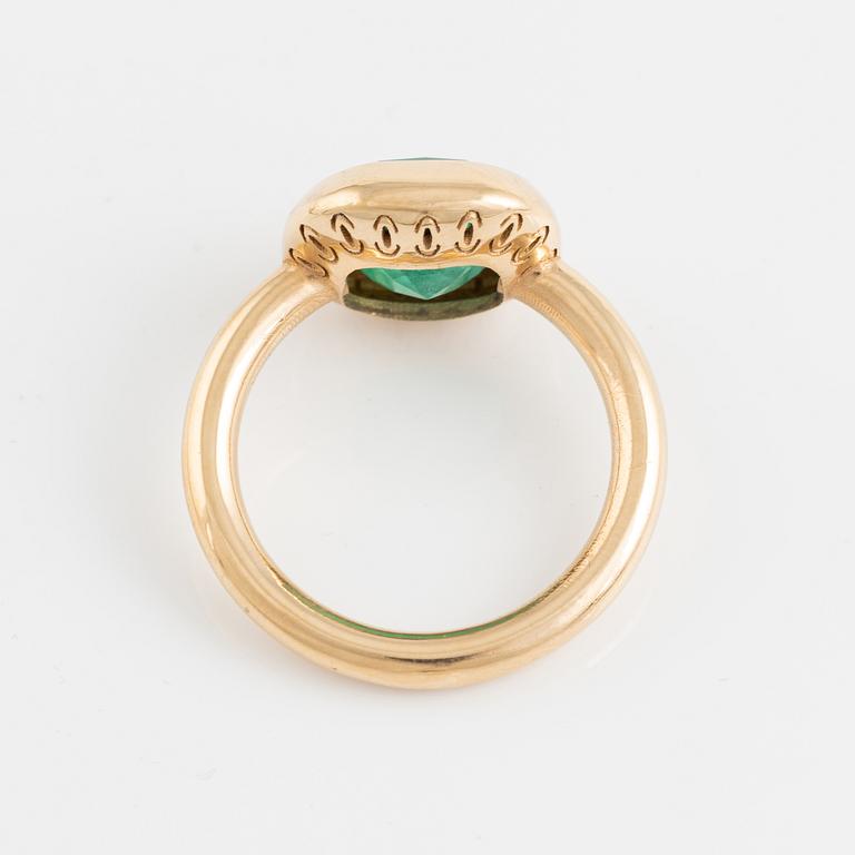18K gold and cushion shaped emerald ring.