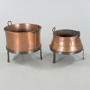 Two 19th century copper cauldrons.