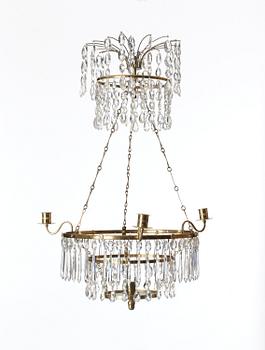 A Gustavian-style four light chandelier.