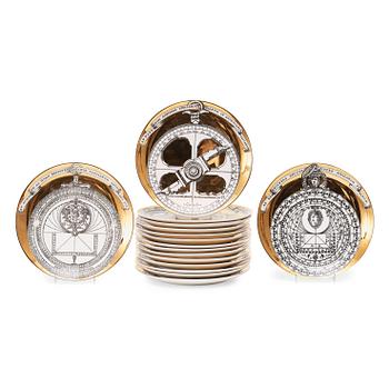 A set of 16 Piero Fornasetti 'Astro Labio' porcelain plates, Milano, Italy.