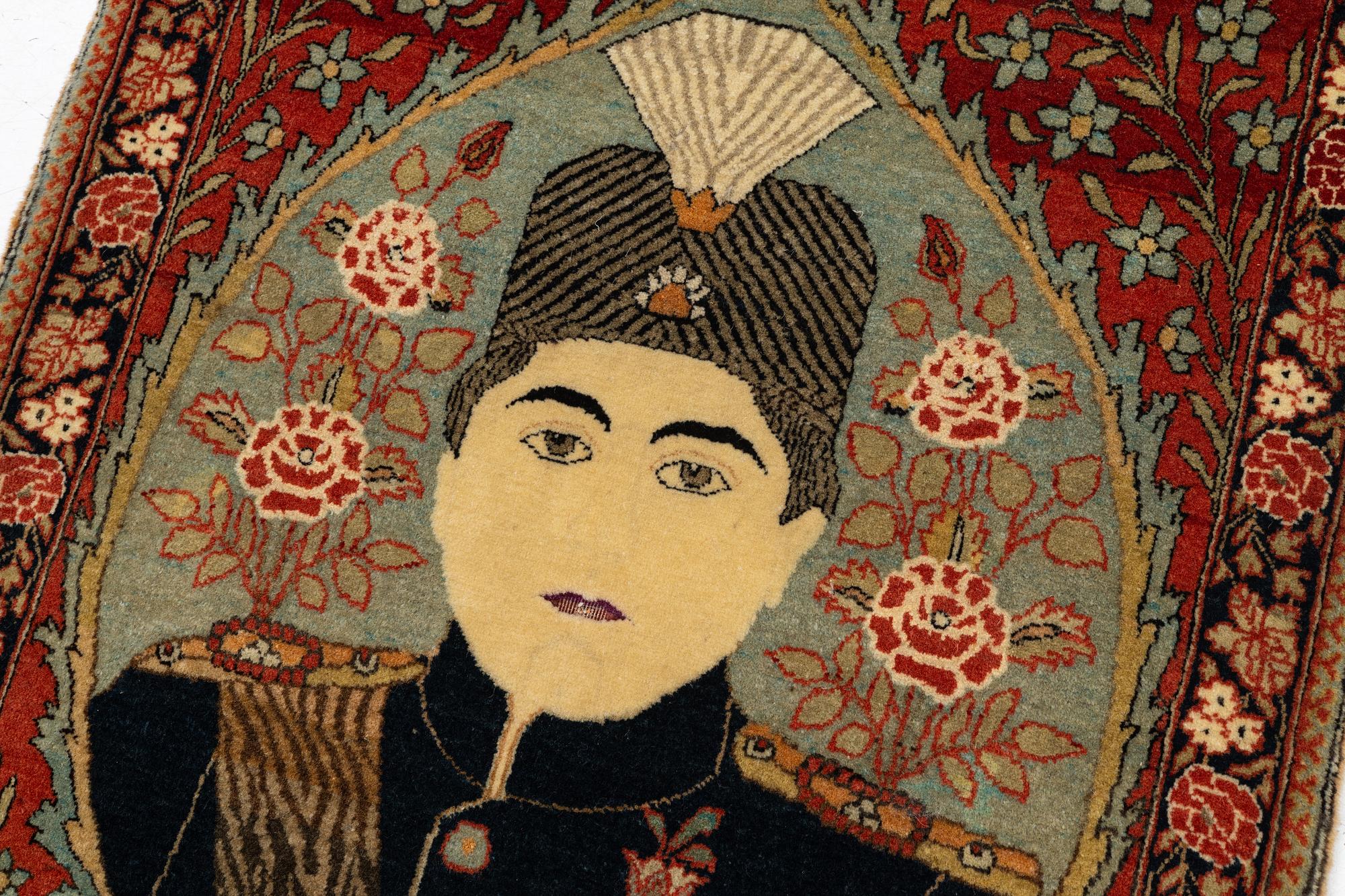 A pictoral Kashan 'Mohtasham' rug c. 80 x 58 cm.