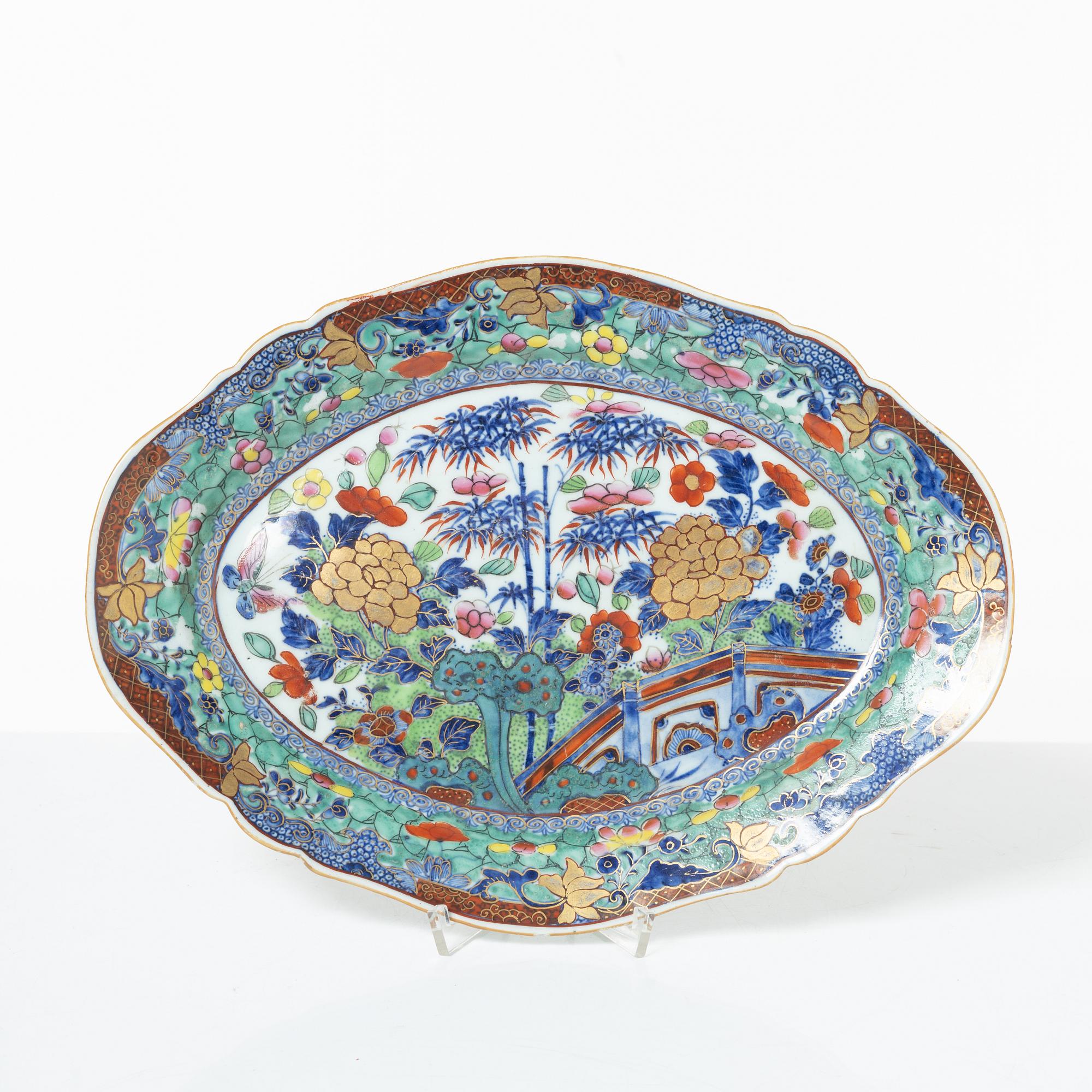 Two Chinese blue and white porcelain dishes and a small dish, Qing dynasty, 18th century.