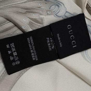 Gucci, a scarf.