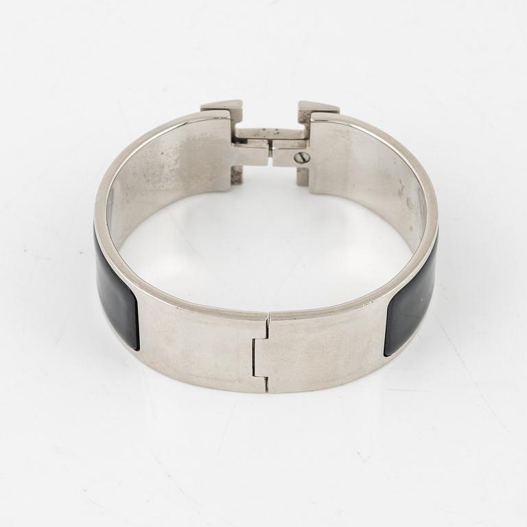Hermès, a 'Clic Clac H' bracelet.