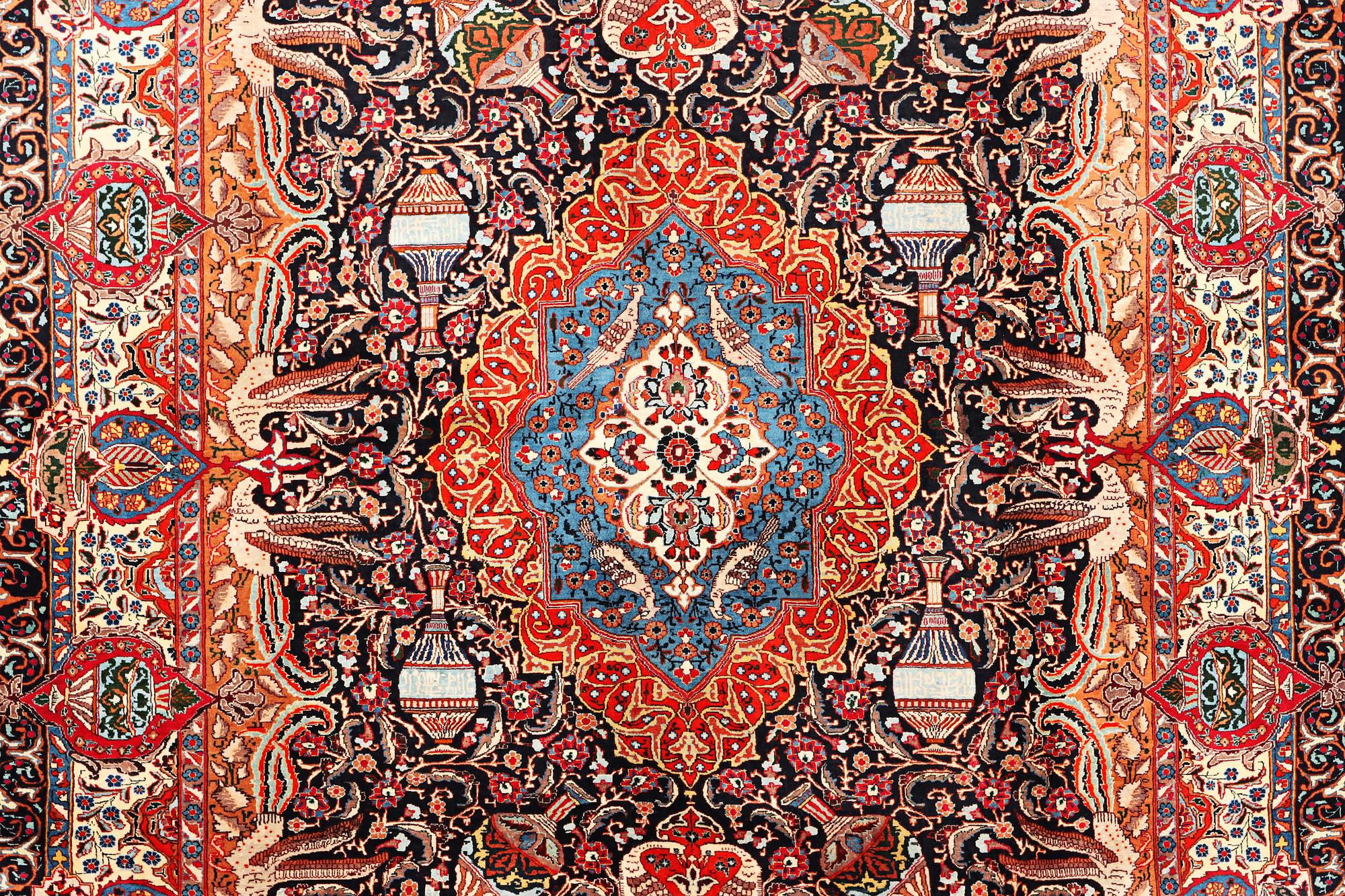 A Kashmar carpet, c. 390 x 305 cm.