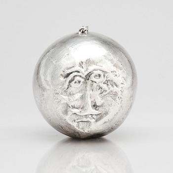 Olle Ohlsson, a silver 'man in the moon' sculpture, Stockholm.
