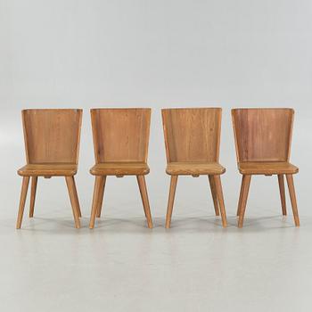 Four chairs, around the mid 20th century.