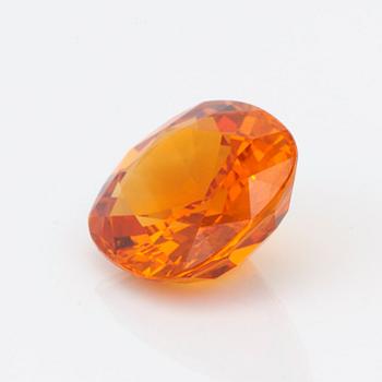 A 7.98 ct yellow-orange sapphire.