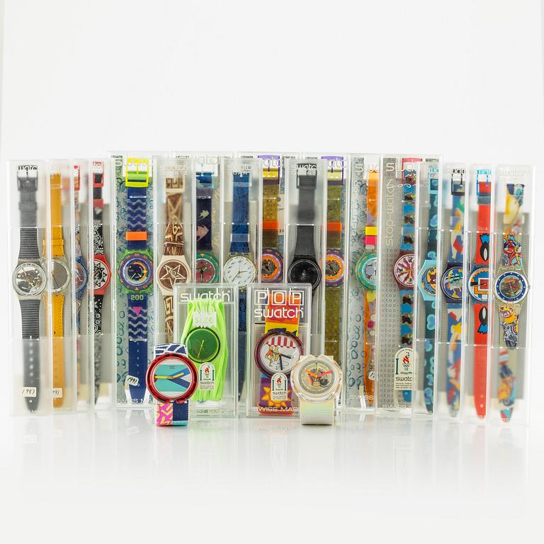 Parti med 21 Swatch-klockor, gummiband och klocklitteratur, "No Reserve".
