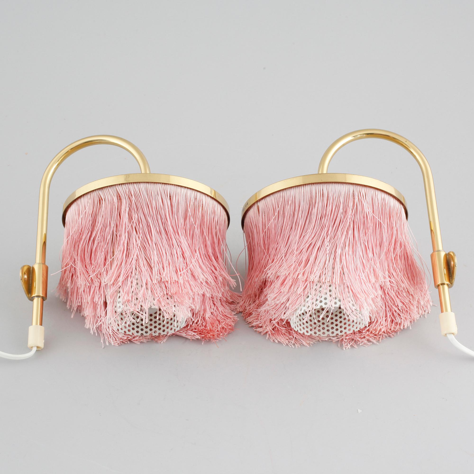 A pair of wall lamps by Hans-Agne Jakobsson for Markaryd from the second half of the 20th century.