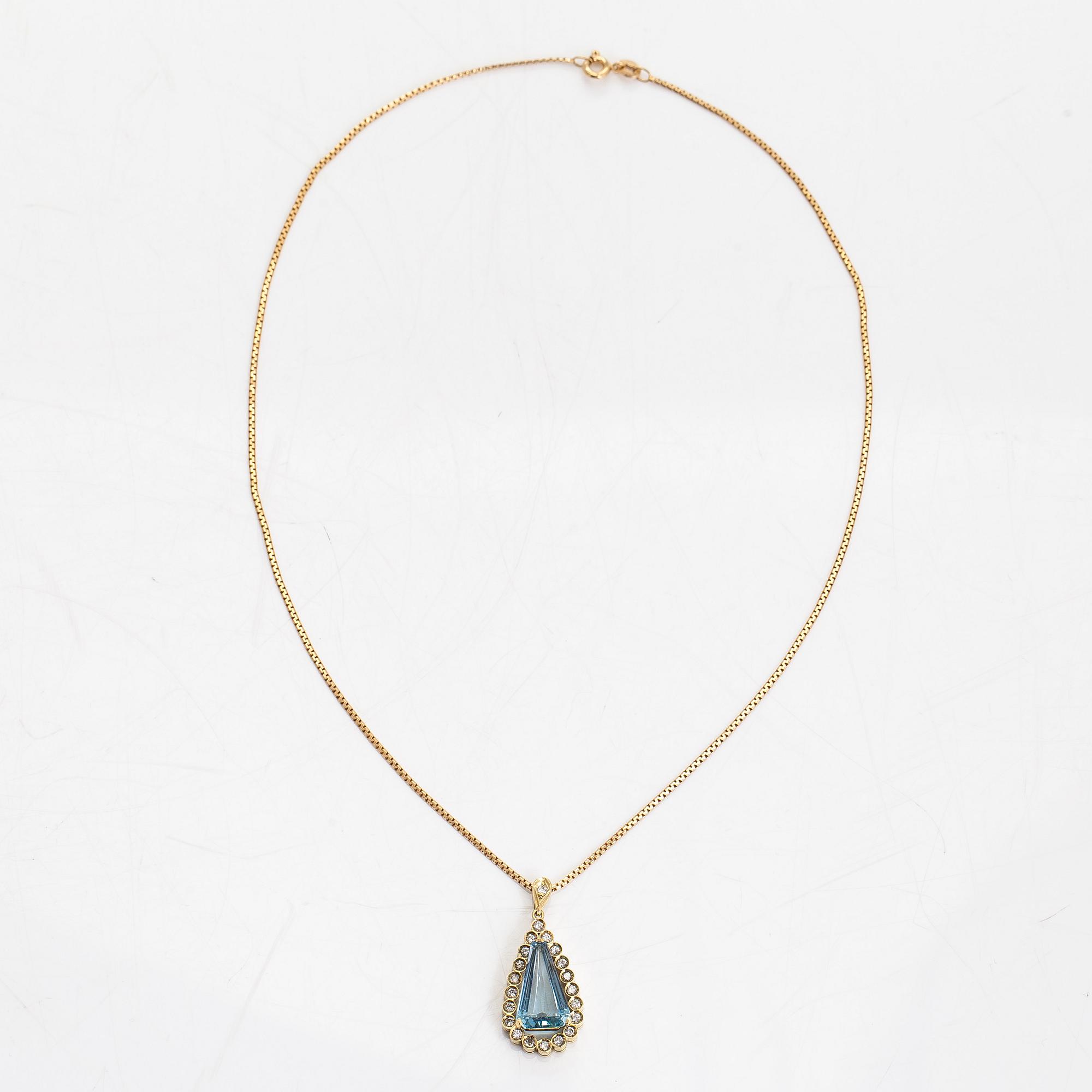 Amsterdam Sauer,an 18K gold pendant with a topaz and diamonds, chain in 14K gold, Unoaerre, Italy.