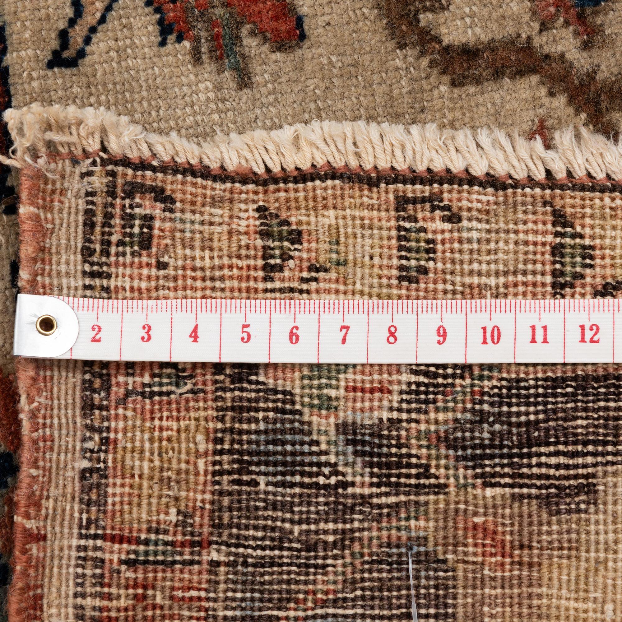An antique Feraghan rug, Western Persia (Iran), c. 203 x 125 cm.