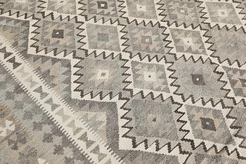 A Kilim rug, approx. 297 x 201 cm.