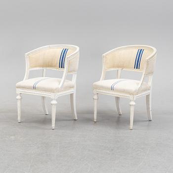 A pair of Gustavian style armchairs from around year 1900.