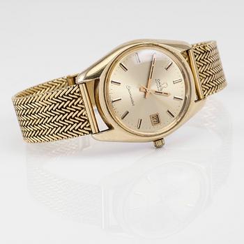 ARMBANDSUR, guld på stål, Omega Seamaster, armband i 18K guld, 1900-talets andra hälft. Total vikt ca 87 g.