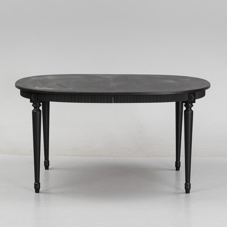 A Gustavians style dining table, second half of the 20th Century.
