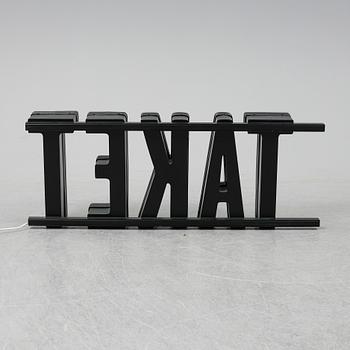 A neon sign "TAKET", late 20th century/21st century.