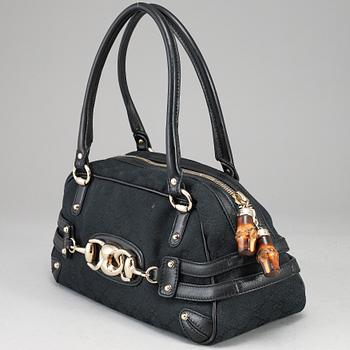 GUCCI, 'GG Canvas Horsebit Wave Handbag'.