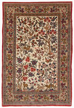 A figural Ghom, rug, c. 160 x 107 cm.