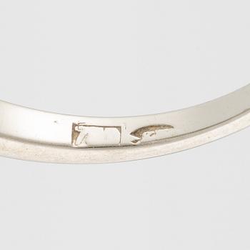 Ring in 18K white gold set with five old-cut diamonds.