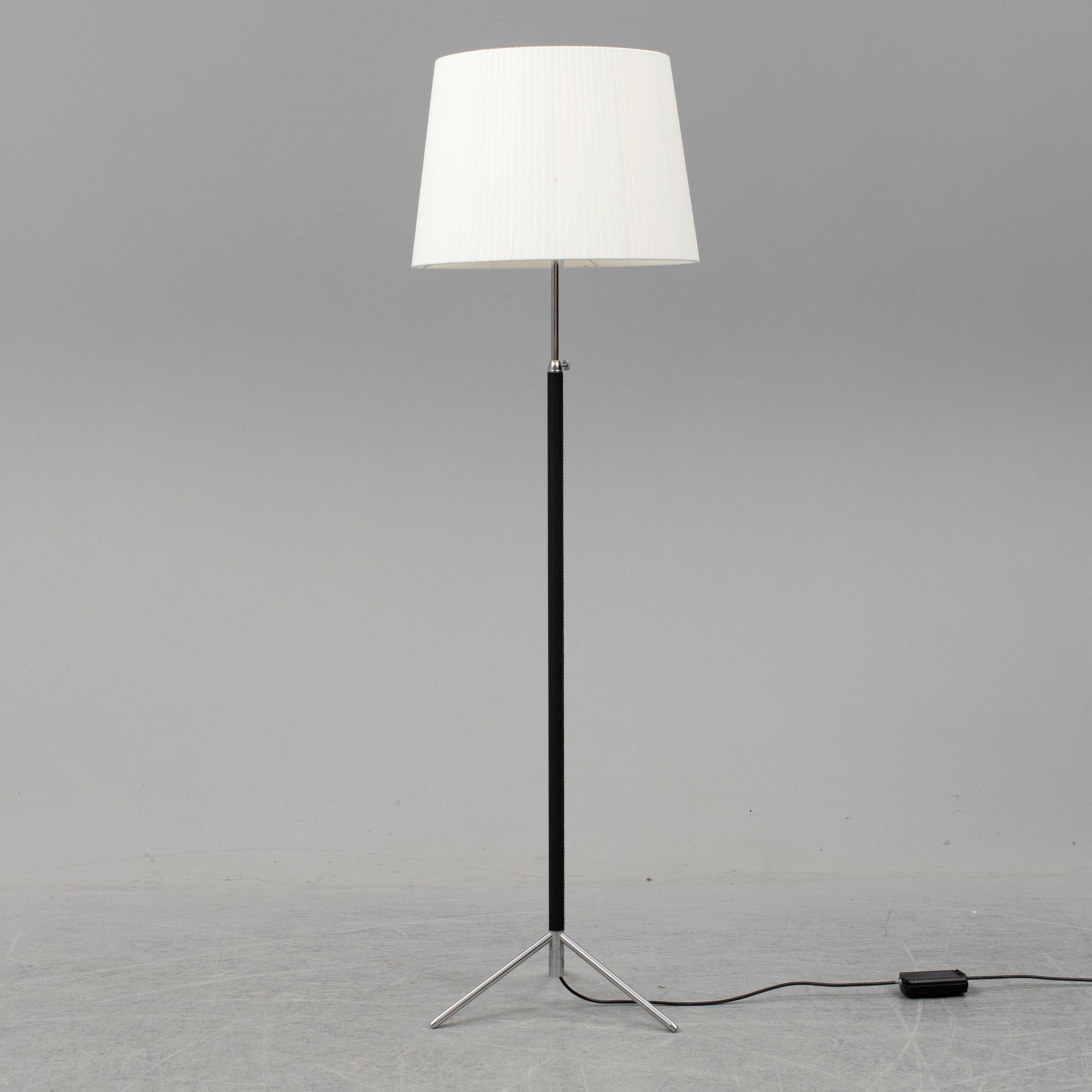 Three contemporary floorlamps by Santa & Cole.