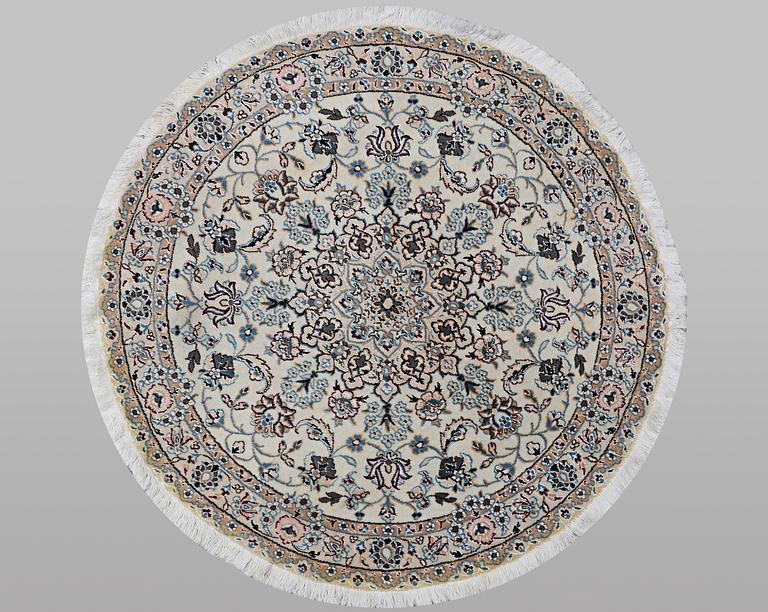 A carpet, Nain, part silk, ca 116 x 116 cm.