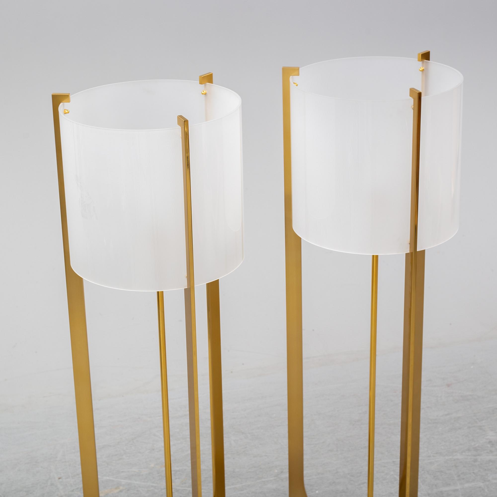 A contemporary pair of 'Arceaux' floor lights by Jacques Charles for Charles Paris.