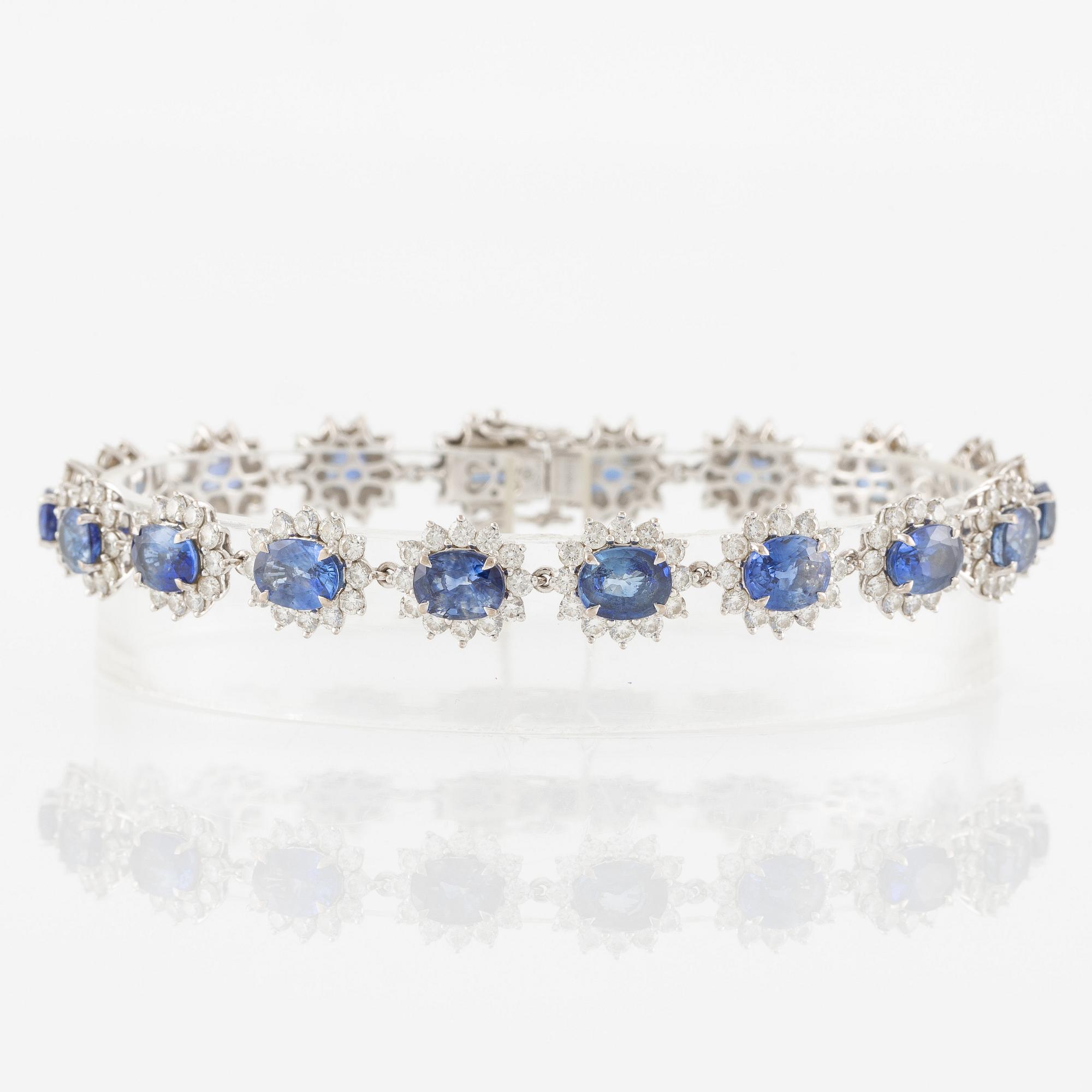Bracelet 18K white gold with step-cut sapphires and round brilliant-cut diamonds.