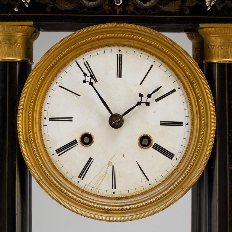 A mid 19th century mantel clock, probably France.