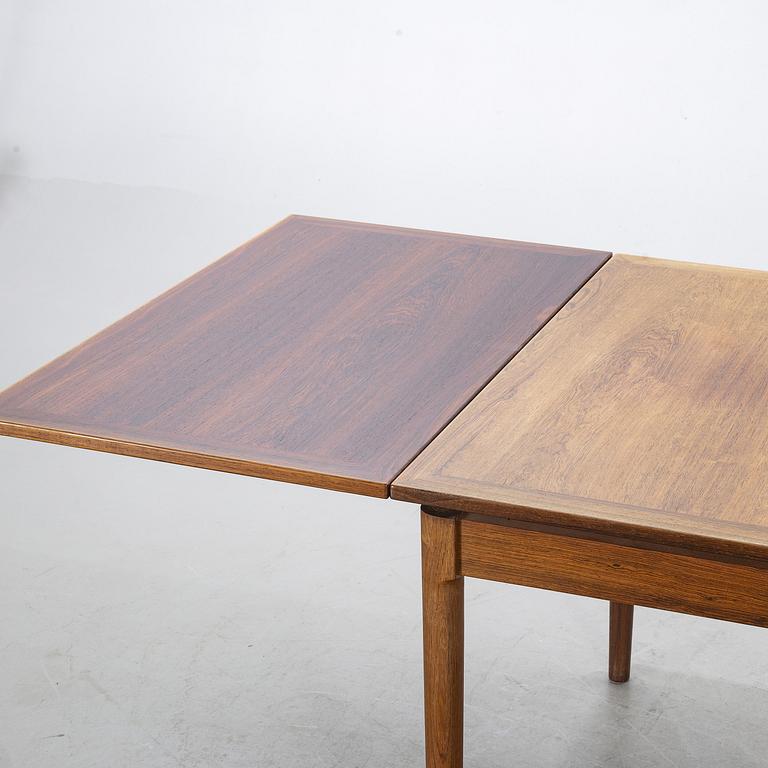 A Table from Slagelse Möbelvaerk A/S and 4 chairs, Niels Otto Møller, JL Møller. Denmark, 1960's.