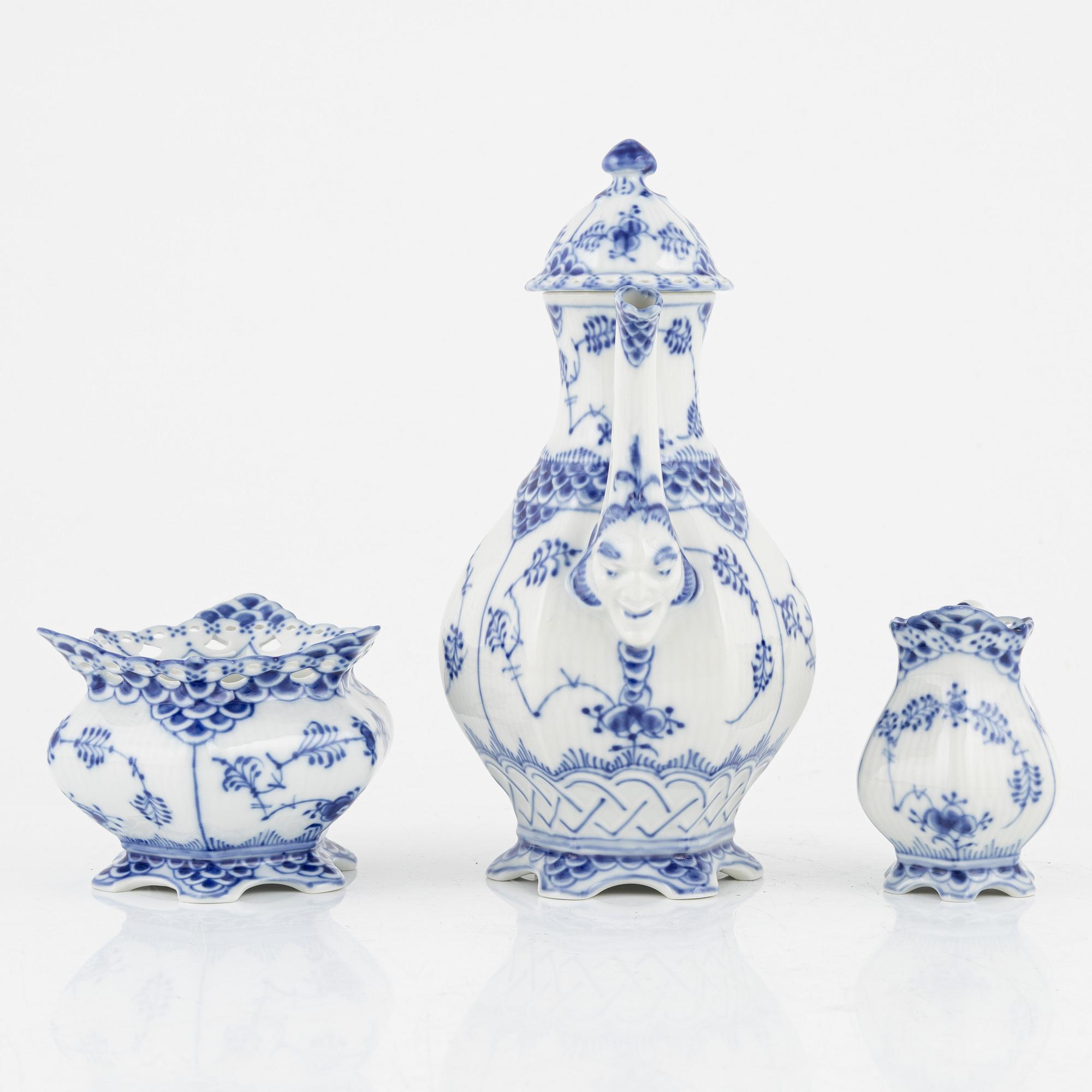 A 'Musselmalet' coffee pot, a sugarbowl and a creamer, Royal Copenhagen, Denmark.