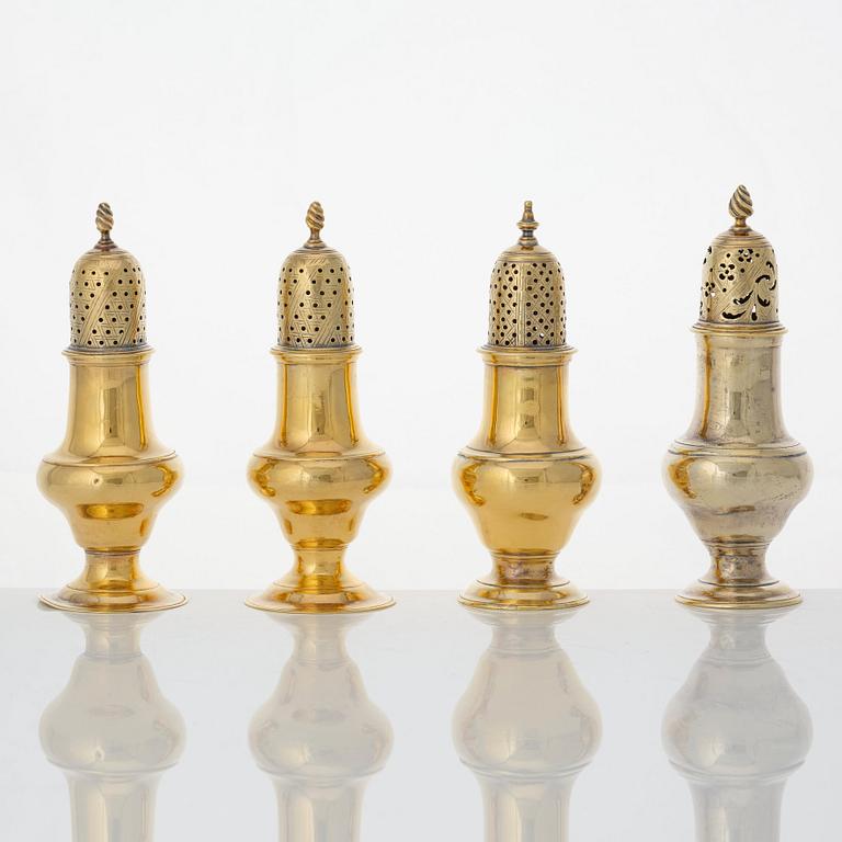 Four English 18th century silver-gilt caster-cruet, one pair marked Thomas Shepherd, 1790, one John Delmester 1760,