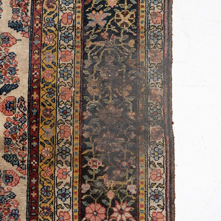 A Bakhtiari carpet, signed, c. 580 x 212 cm.