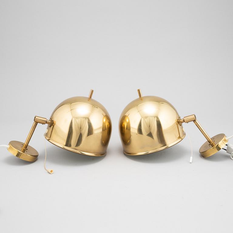 Eje Ahlgren, a pair of brass wall lamps, model V-75, Bergboms.