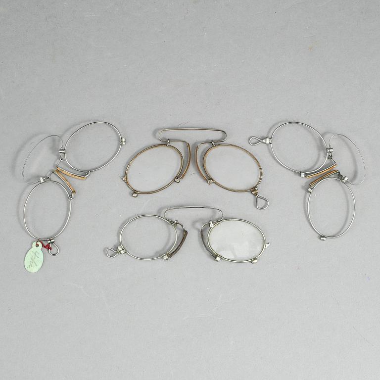 GLASÖGON, 4 st, metall, omkring 1900.