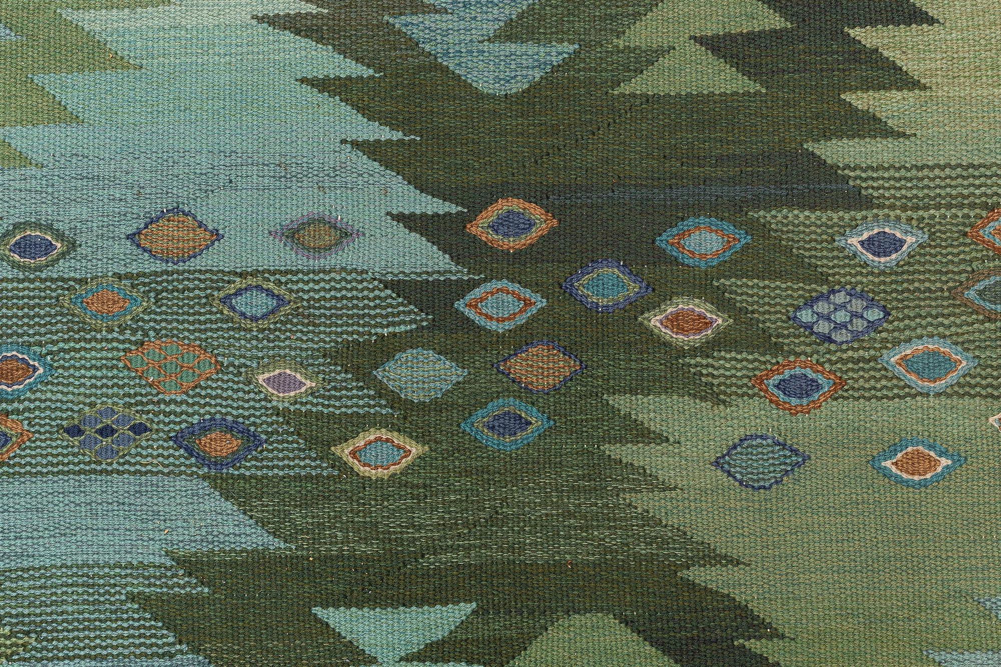 Barbro Nilsson, a 'Tånga blå',  tapestry weave carpet, c. 345 x 277 cm, signed AB MMF BN.