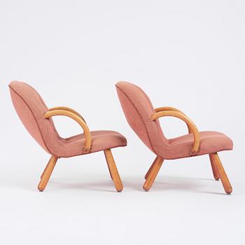 Swedish Modern, a pair of 'Clam Chairs', possibly by Erik Eks Snickerifabrik, probably 1950s.