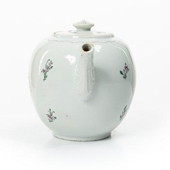 Cups and saucers, 11+7, and a teapot in famille rose with monogram, company porcelain, China, 18th century.
