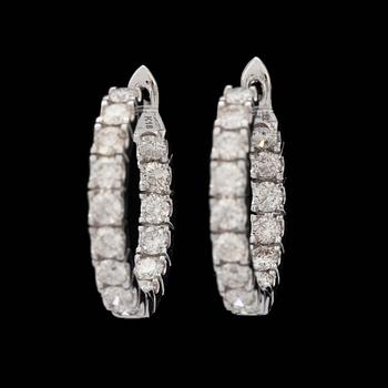 A pair of brilliant-cut diamond hoop earrings, total carat weight 2.22 cts.