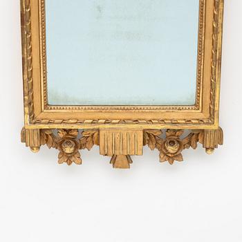 A Gustavian giltwood mirror by L. Lundén (master in Stockholm 1773-1819).