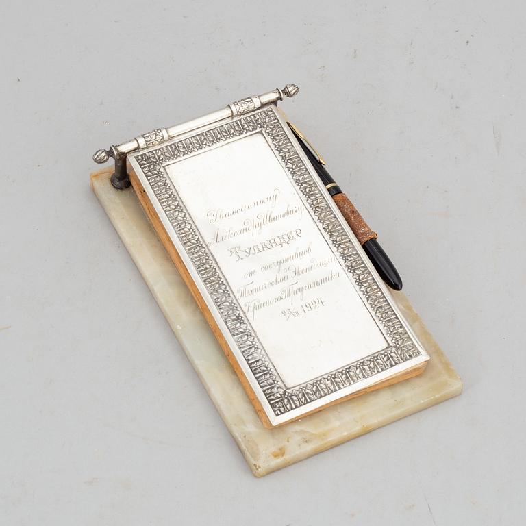 A 1910/20's russian silver and onyx notepad stand.