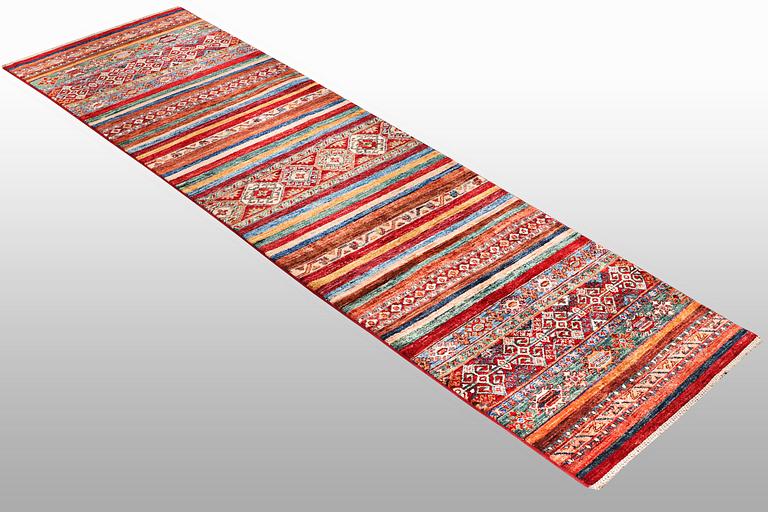 A runner carpet, Khorjin, ca 305  x 84 cm.