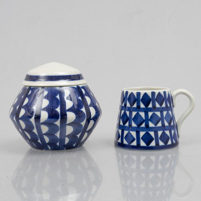 Karin Björquist, a set of nine "Indigo" stoneware vases and bowls, Gustavsbergs studio, 1950s.