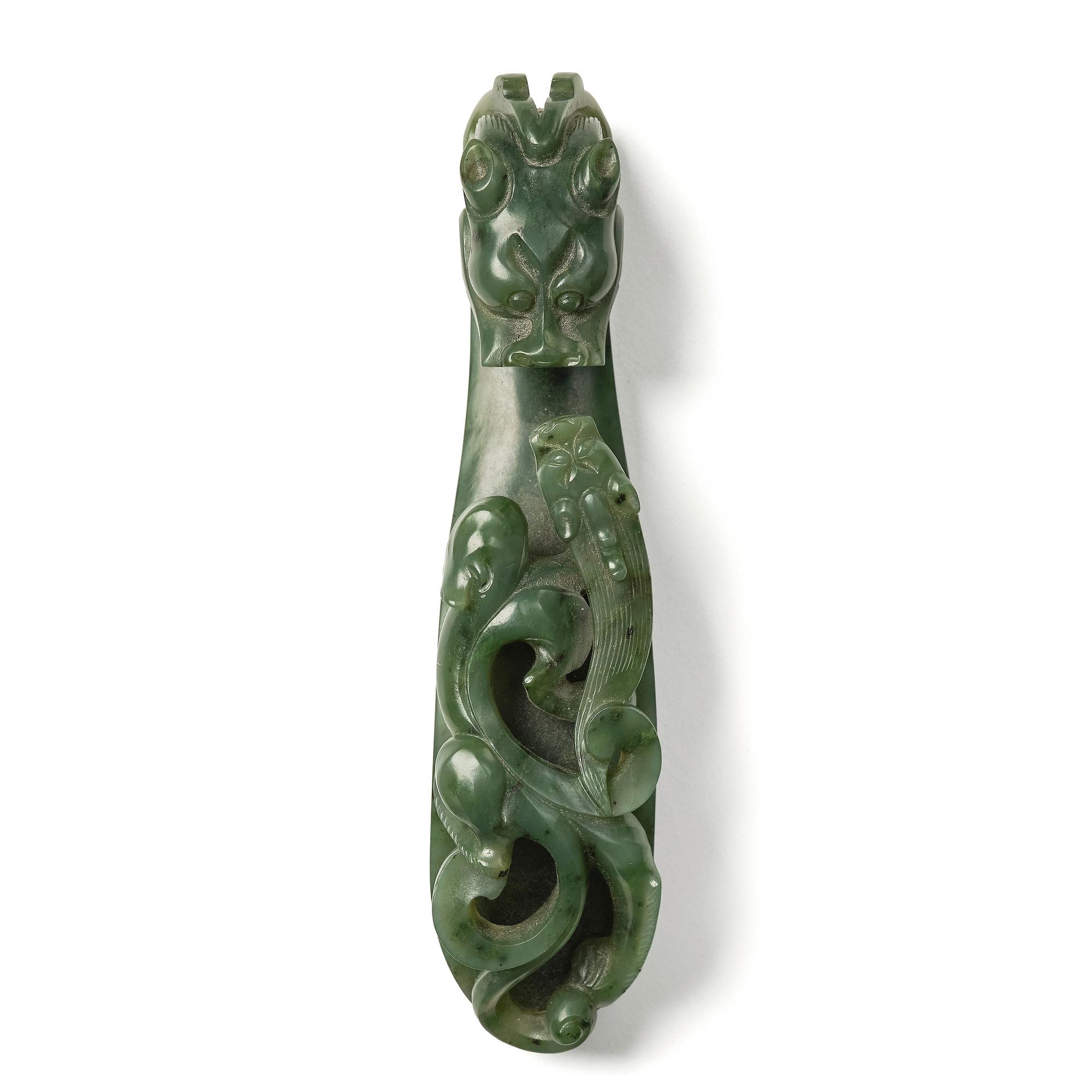 A nephrite belt hook, China, early 20th Century or older.