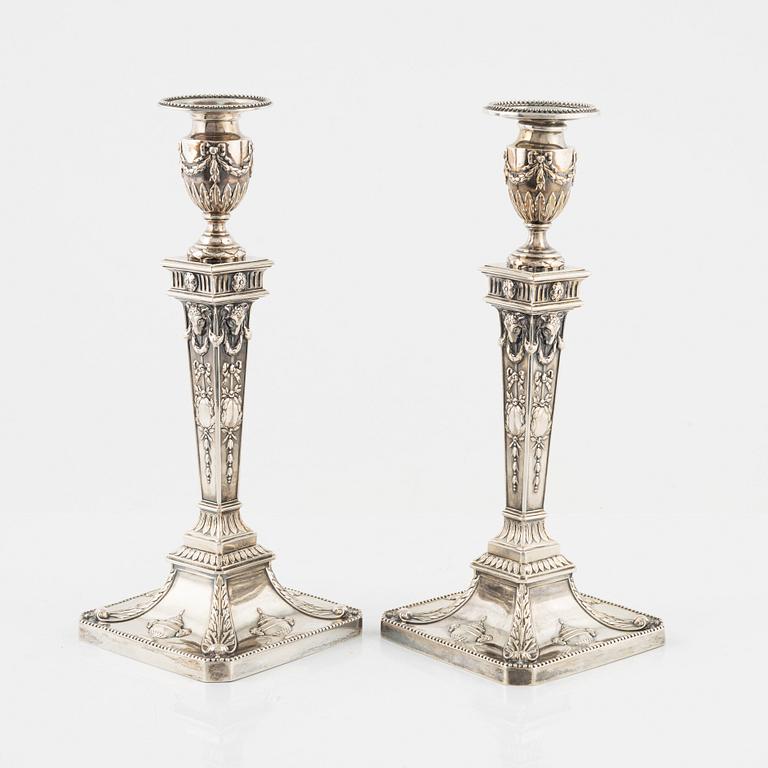 a pair of Louis XVI style silver candle sticks, Vienna, Austria, around 1900.